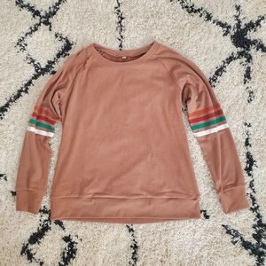 Light brown sweater with striped sleeves